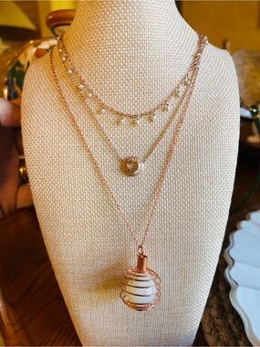 3 Rose Gold tone necklaces.  2 are adjustable